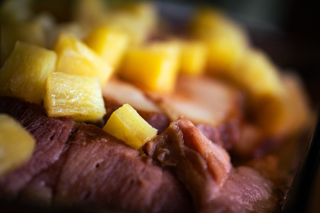 Close up of Czech svíčková beef dish with dumpling slices