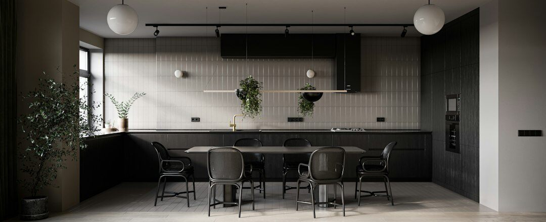 Bright modern Czech home kitchen with wooden table and ceramic dishes
